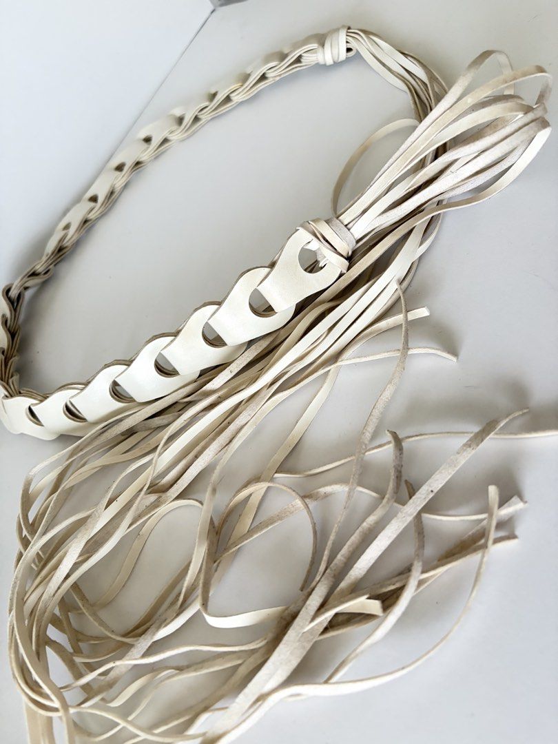 10. White String Leather Belt (Category: Belts) located in Quezon City. Submitted by wagwagan_ukay_blues (Listing ID 1466237880, Image 3). Description: From Japan In good condition Please expect signs of usage Overall - 26”-60” Width -1” Novaliches Qc.