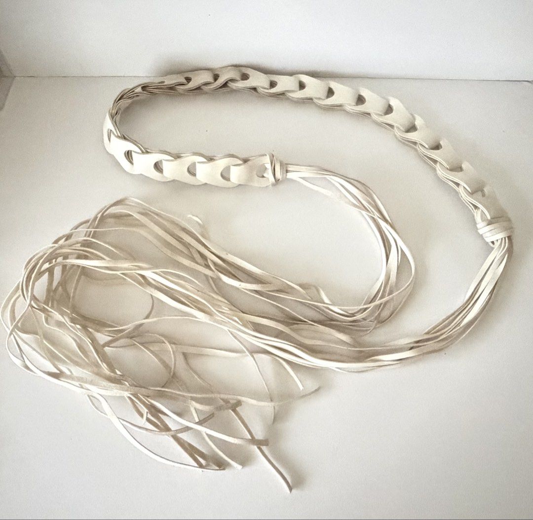 10. White String Leather Belt (Category: Belts) located in Quezon City. Submitted by wagwagan_ukay_blues (Listing ID 1466237880, Image 2). Description: From Japan In good condition Please expect signs of usage Overall - 26”-60” Width -1” Novaliches Qc.
