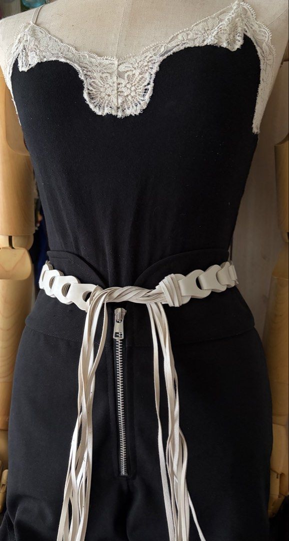 10. White String Leather Belt (Category: Belts) located in Quezon City. Submitted by wagwagan_ukay_blues (Listing ID 1466237880, Image 1). Description: From Japan In good condition Please expect signs of usage Overall - 26”-60” Width -1” Novaliches Qc.