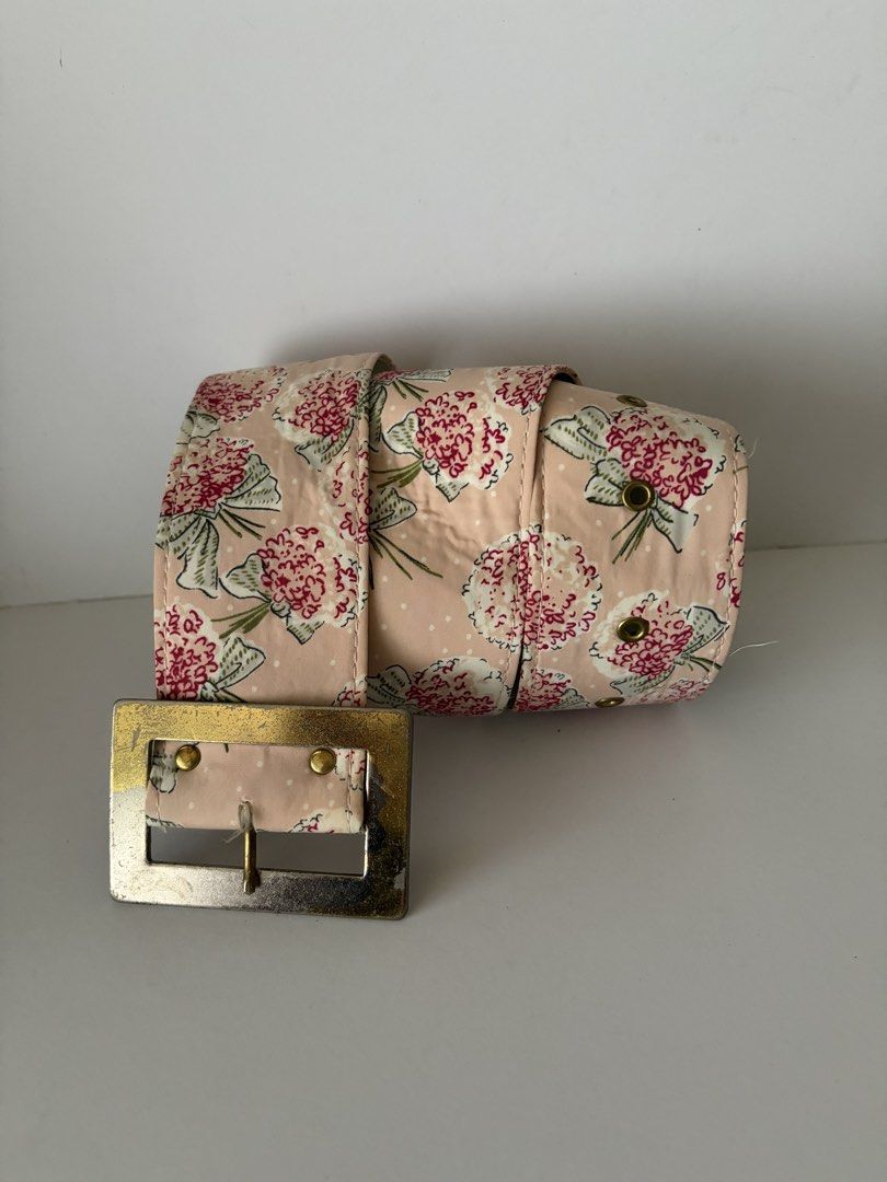 10. Wide Peach Floral Belt (Category: Belts) located in Quezon City. Submitted by wagwagan_ukay_blues (Listing ID 1466236353, Image 1). Description: From Japan In good condition Please expect signs of usage ❗️buckle discoloration Hole Size -23”-26” Overall - 30” Width -2” Novaliches Qc.