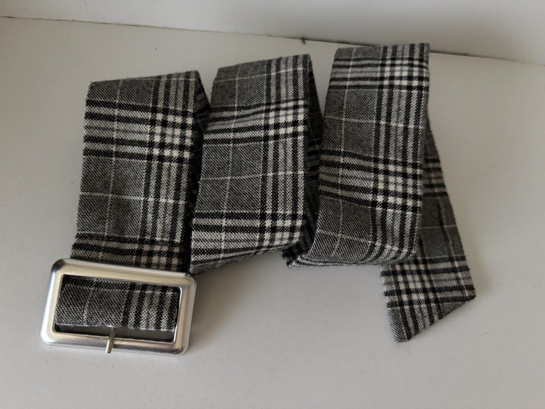 10. Wide Plaid Gray&White Fabric Belt (Category: Belts) located in Quezon City. Submitted by wagwagan_ukay_blues (Listing ID 1466230430, Image 3). Description: From Japan In good condition Please expect signs of usage Hole Size -27”-30” Overall - 34” Width -2” Novaliches Qc.