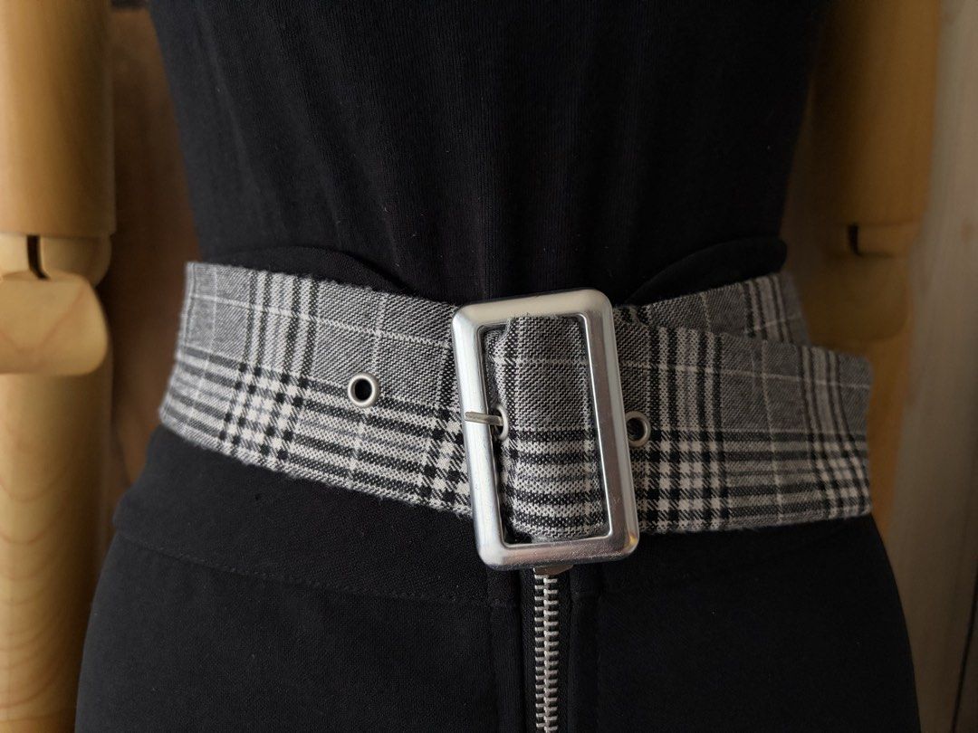 10. Wide Plaid Gray&White Fabric Belt (Category: Belts) located in Quezon City. Submitted by wagwagan_ukay_blues (Listing ID 1466230430, Image 2). Description: From Japan In good condition Please expect signs of usage Hole Size -27”-30” Overall - 34” Width -2” Novaliches Qc.