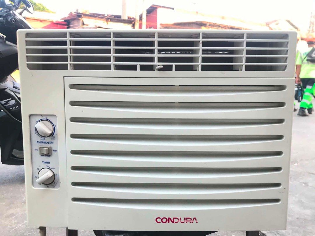 1HP Condura Window Type Air Conditioner (Category: Air Conditioning and Heating) located in Manila. Submitted by almira_03 (Listing ID 1466254261, Image 1). Description: - Brand: Condura - Type: Window type air conditioner - Color: Off-white - Controls: Mechanical dials (Thermostat, Fan speed, Timer) - Features: Clean front louvers, classic red Condura logo - Condition: Well-maintained and fully functional - FREE DELIVERY - COD PAYMENT - SAME DAY