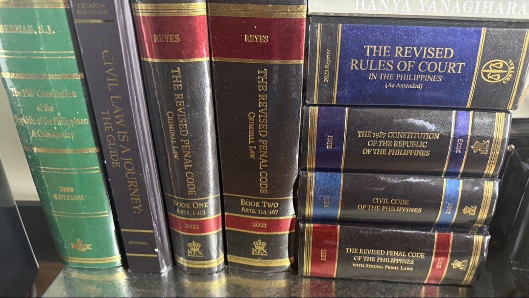 Gently used 1L Law Books (Category: Textbooks) located in Mandaluyong City. Submitted by karuye_ (Listing ID 1466224369, Image 1). Description: Various Philippine law textbooks and codals including the 1987 Constitution commentary by Bernas, Civil Law Guide, Revised Penal Code books one and two by Luis Reyes, Revised Rules of Court, Civil Code, and Special Penal Laws. Published by Rex Book Store and Central Books. Essential reference materials fo