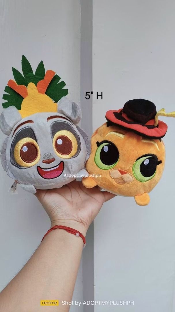 [2] DreamWorks Bundle Plush Toys (Category: Plushies & Soft Toys) located in Taguig. Submitted by adopt.my.plush.ph (Listing ID 1466227121, Image 1). Description: 2 for 200.00 DreamWorks KouKou stackable mini plushies, chibi-fied, capsule-shaped plush toys featuring: • King Julien from the Madagascar franchise, complete with his signature leafy crown. • Puss in Boots from the Shrek and Puss in Boots movies, wearing his classic black cavalier hat 