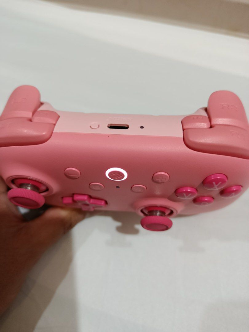 8Bitdo Ultimate 2C Bluetooth Controller Pink (Category: Controllers) located in Quezon City. Submitted by gab.cerdena (Listing ID 1466157248, Image 2). Description: Nabili ko sa P850. Like-new Pink 8BitDo Ultimate 2C Bluetooth controller bought recently from PixelPlay. Features Hall effect sticks, USB-C, and a clean matte pastel finish. Hardly used and fully working!.