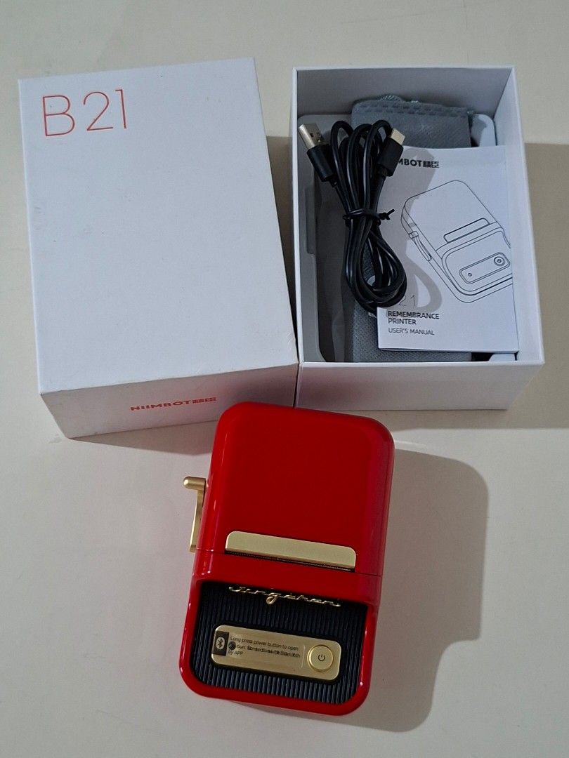 ### 🏷️✨ Niimbot B21 Portable Label Printer – Red (Category: Home Improvement Tools & Accessories) located in Taguig. Submitted by authprelovedonlineshop1 (Listing ID 1466174826, Image 1). Description: ### 🏷️✨ Niimbot B21 Portable Label Printer – Red **Bluetooth • Inkless • Like New! ❤️** - 🏷️ **Niimbot B21 Portable Label Printer** - ❤️ Color: **Red** - 📱 **Bluetooth connectivity** - 🖨️ **Inkless thermal printing** - ✨ **Like-new condition** 