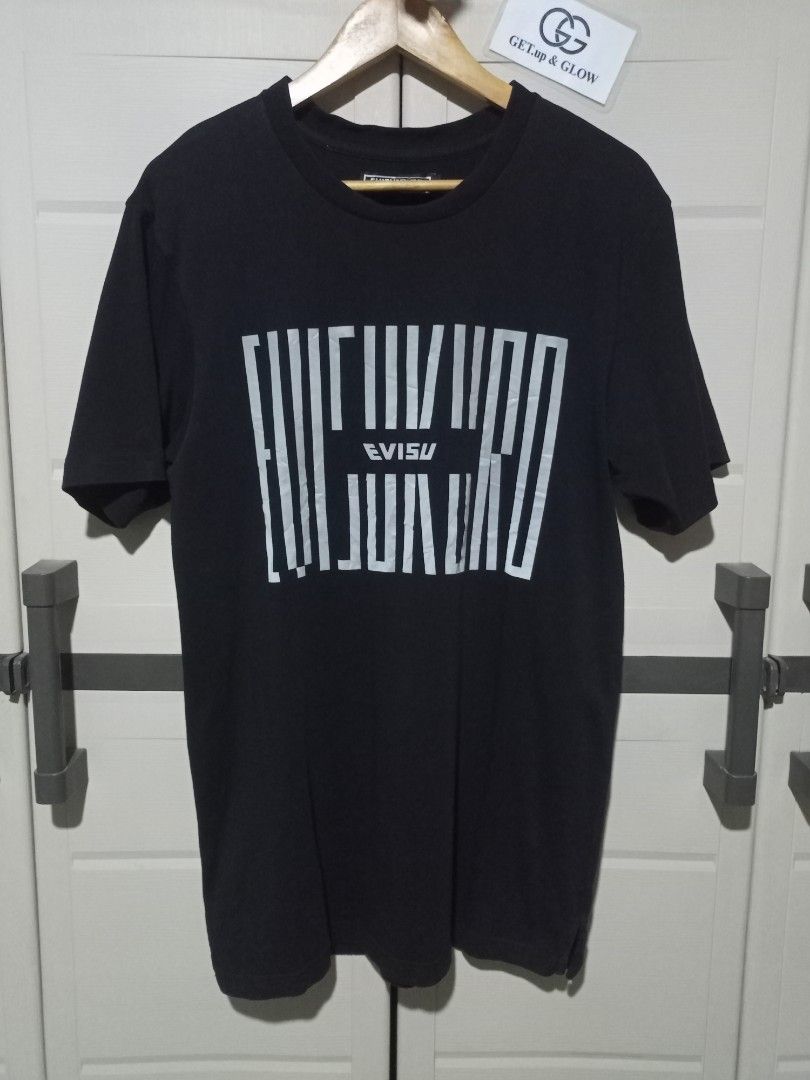 ✅ EVISU KURO Shirt (Category: Tshirts & Polo Shirts ) located in Palo. Submitted by getupandglow (Listing ID 1466290812, Image 1). Description: ✅ EVISU KURO Shirt Reflective Prints Size: Large Dimes: 21x31 Issue: Slightly Stretch Neck Condition: Very Good overall Colorate: 9.8/10 Price: 350 only + sf 📍 Location: LEYTE MODE OF PAYMENT 💳 GCash (Payment 1st) | ✈️ J&T 📩 MAKE OFFER nalang if interested..