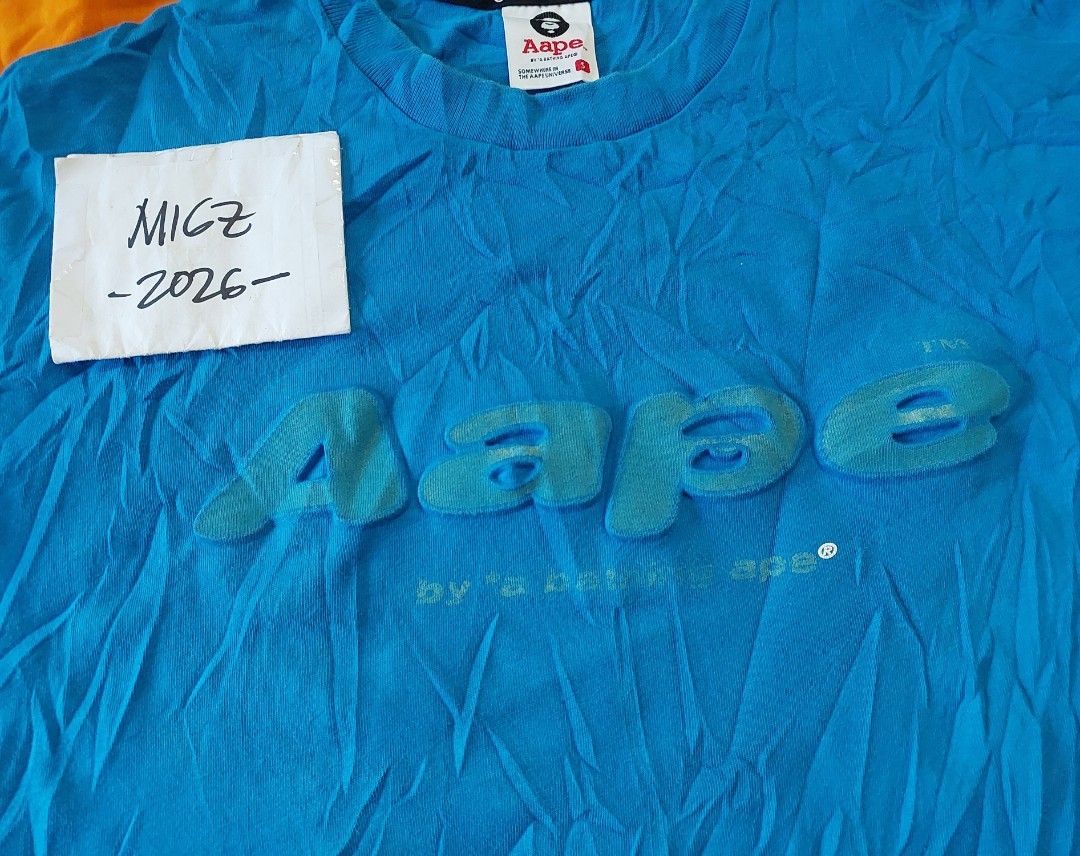 AAPE Blue T shirt (Category: Tshirts & Polo Shirts ) located in Davao. Submitted by juanmigz.ph (Listing ID 1466214642, Image 2). Description: AAPE Blue Logo Tee (Mens) Excellent ✅️ *Embossed Front Print w/ flaws (erase/flaking paint on graphic print) *Color 9/10 👌🏾 *Solid Back Print 9/10 👌🏾 size: Small "20.5 W x 28 L" Php 1,000.00 PM for more Inquiry 😁....