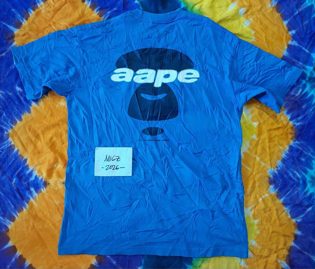 AAPE Blue T shirt (Category: Tshirts & Polo Shirts ) located in Davao. Submitted by juanmigz.ph (Listing ID 1466214642, Image 3). Description: AAPE Blue Logo Tee (Mens) Excellent ✅️ *Embossed Front Print w/ flaws (erase/flaking paint on graphic print) *Color 9/10 👌🏾 *Solid Back Print 9/10 👌🏾 size: Small "20.5 W x 28 L" Php 1,000.00 PM for more Inquiry 😁....