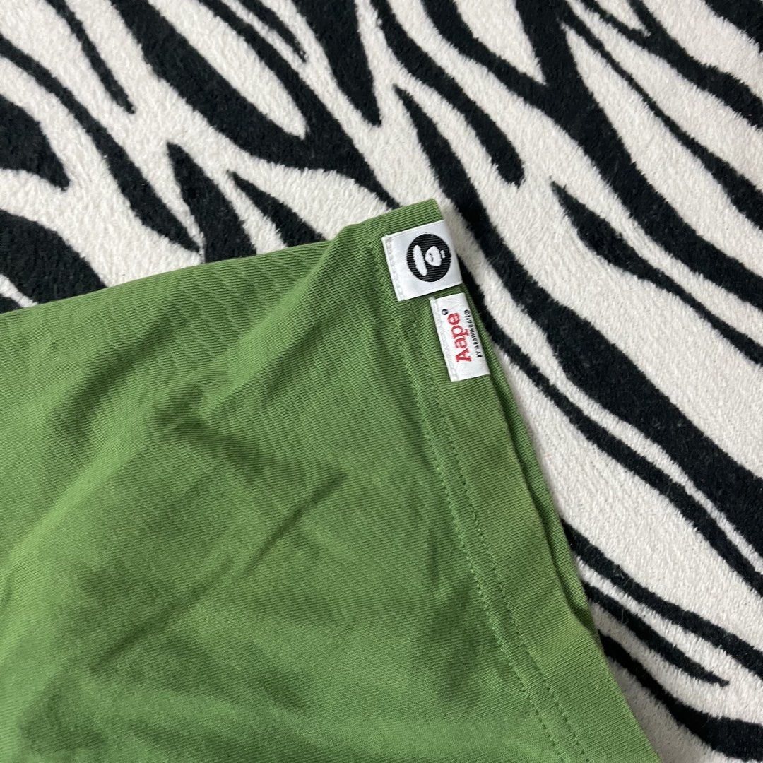 Aape green multi logo tshirt (Category: Tshirts & Polo Shirts ) located in Manila. Submitted by royaldripmanila (Listing ID 1466287122, Image 3). Description: No issue W23 L29.5.