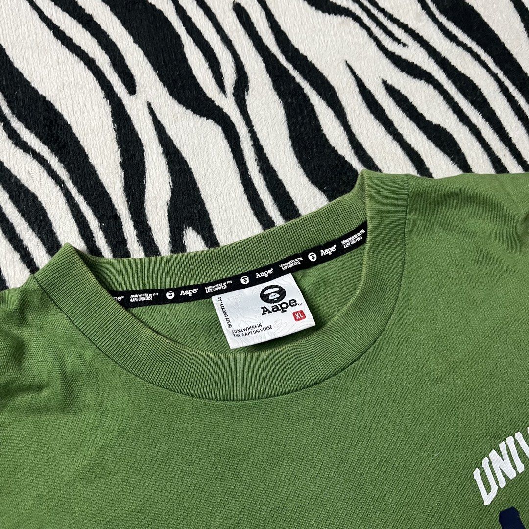 Aape green multi logo tshirt (Category: Tshirts & Polo Shirts ) located in Manila. Submitted by royaldripmanila (Listing ID 1466287122, Image 2). Description: No issue W23 L29.5.