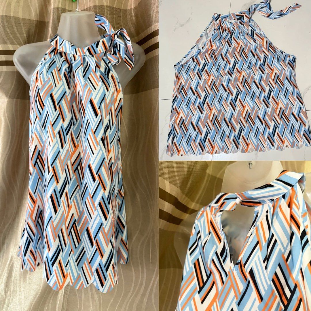 Abstract Print Halter Tunic Top (Category: Sleeveless) located in Caloocan City. Submitted by lovedbyzee (Listing ID 1466280886, Image 1). Description: ₊˚⊹♡ ➔ Brand: Boutique ₊˚⊹♡ ➔ Size: Plus Size ₊˚⊹♡ ➔ Lightweight short-sleeve top featuring a bold abstract brushstroke pattern in blue, white, and black, a flattering round neckline with a small front keyhole cut-out, and a comfortable relaxed fit. ₊˚⊹♡ ➔ Condition: Excellent brand new condition!