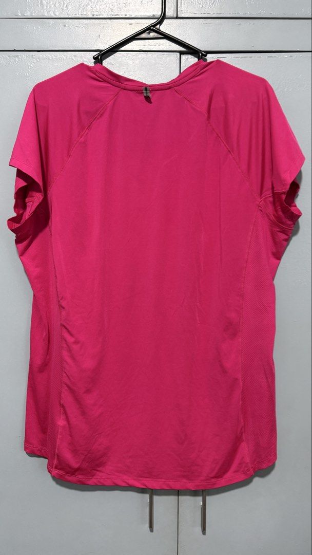 Active Essentials by Tombo Pink V-Neck Athletic Top XL (Category: Shirts) located in Quezon City. Submitted by amogz (Listing ID 1466325313, Image 3). Description: Bright pink Active Essentials by Tombo athletic tee in size XL. Features a V-neck, short sleeves, and breathable mesh side panels. Perfect for workouts or casual wear..