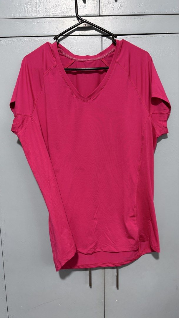 Active Essentials by Tombo Pink V-Neck Athletic Top XL (Category: Shirts) located in Quezon City. Submitted by amogz (Listing ID 1466325313, Image 1). Description: Bright pink Active Essentials by Tombo athletic tee in size XL. Features a V-neck, short sleeves, and breathable mesh side panels. Perfect for workouts or casual wear..
