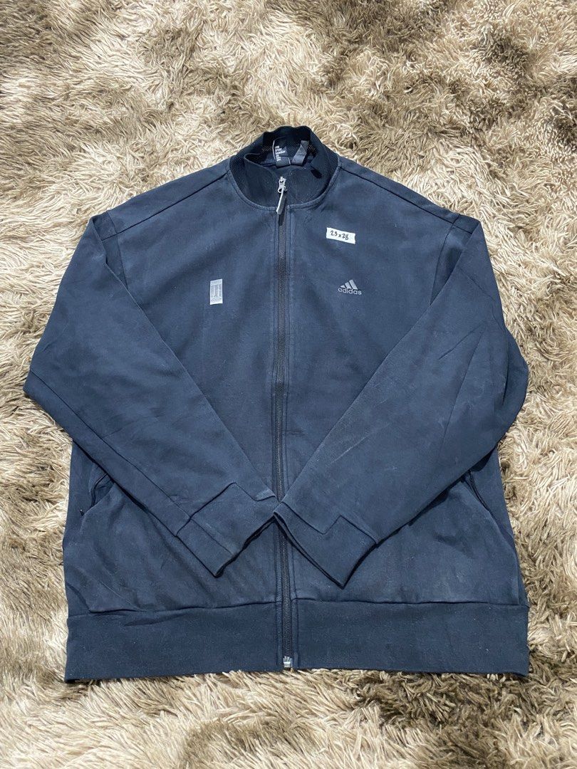 Adidas Black Track Jacket Zip Up (Category: Coats, Jackets and Outerwear) located in Cagayan de Oro. Submitted by sepamorash53558 (Listing ID 1466328661, Image 1). Description: - Brand/Style: Adidas black zip-up track jacket - Size: XL (23" pit to pit x 28" length) - Details: Ribbed collar with textured mesh interior, full front zip, small zippered side gussets - Material: 69% cotton, 31% recycled polyester - Origin: Made in Philippines - Conditi