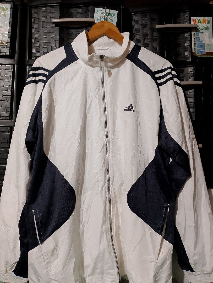 Adidas Climalite White and Navy Track Jacket (Category: Coats, Jackets and Outerwear) located in Manila. Submitted by adrianaban04817 (Listing ID 1466245940, Image 1). Description: Adidas windbreaker size XL good condition wash only minimal issue Yung sa back sa noo 24×29 .