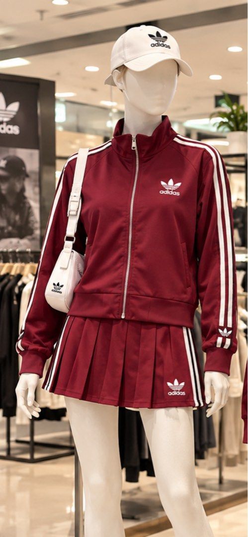 Adidas Coords Jacket and Pleated Skort Set (Category: Coats, Jackets and Outerwear) located in Manila. Submitted by shopaholic_gurl (Listing ID 1466244841, Image 2). Description: Red matching tracksuit set. Includes a full-zip track jacket with white three-stripe details and embroidered trefoil logo, paired with a matching pleated skort. Brand new look, perfect for casual wear and sporty fashion. Free size.