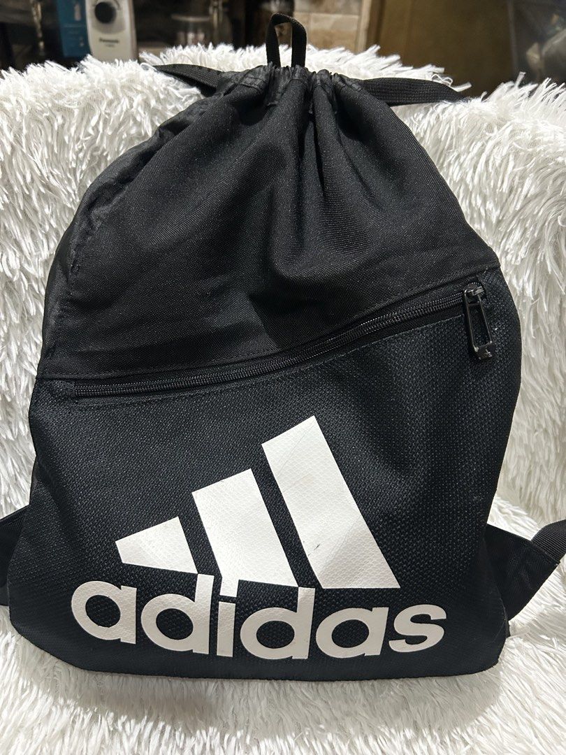 Adidas Drawstring Backpack (Category: Backpacks) located in Pasig City. Submitted by minminreyn (Listing ID 1466183139, Image 1). Description: Adidas Drawstring Bagoack No butas No punit No Sira Preloved Condition Cavite Jnt Sf: 55 pesos Lalamove kayo po ang magbook .