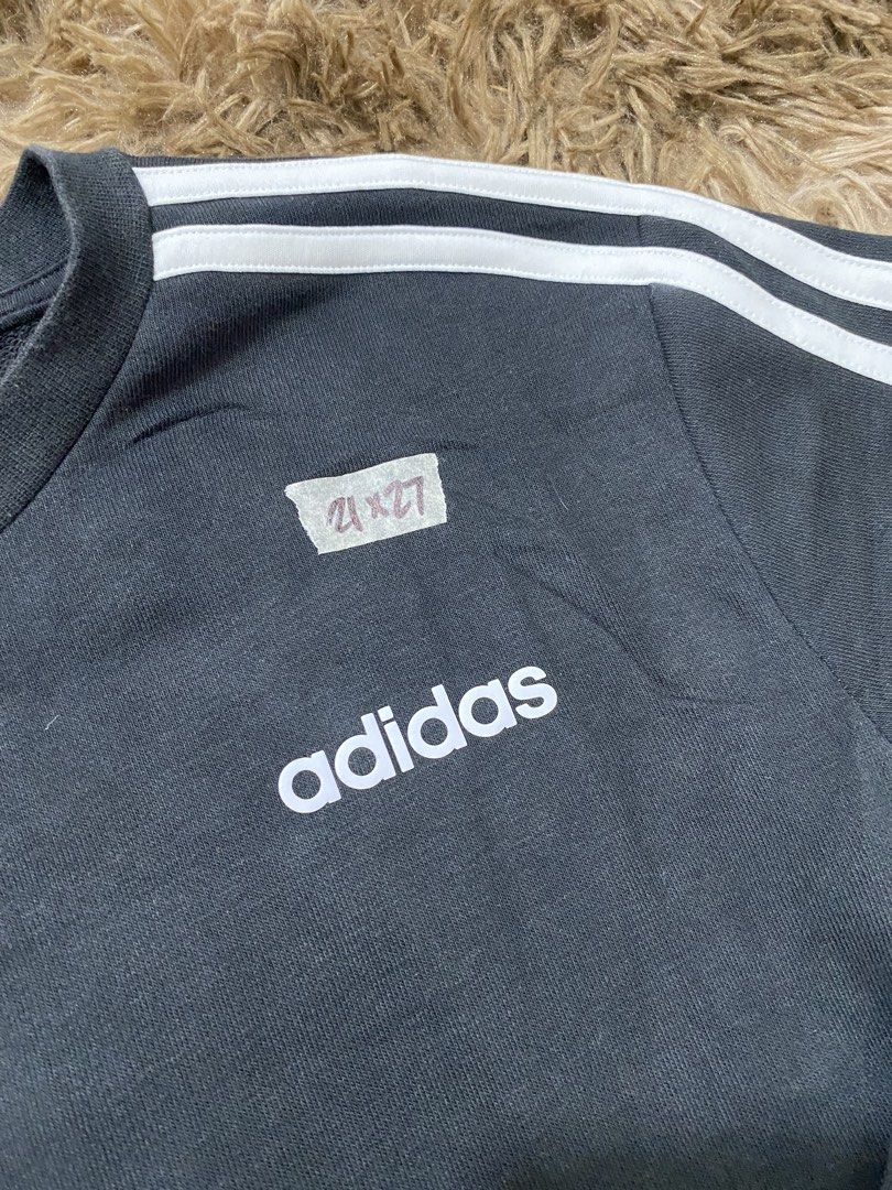 Adidas E 3S Crew FT Sweatshirt Black Size M (Category: Coats, Jackets and Outerwear) located in Cagayan de Oro. Submitted by sepamorash53558 (Listing ID 1466328804, Image 2). Description: - Brand: Adidas - Style: Crewneck sweatshirt - Color: Black with classic white three stripes - Size: Medium (M) - Material: 70% cotton, 30% polyester - Details: Small white Adidas logo on left chest, ribbed cuffs and hem - Condition: Clean and ready to wear.