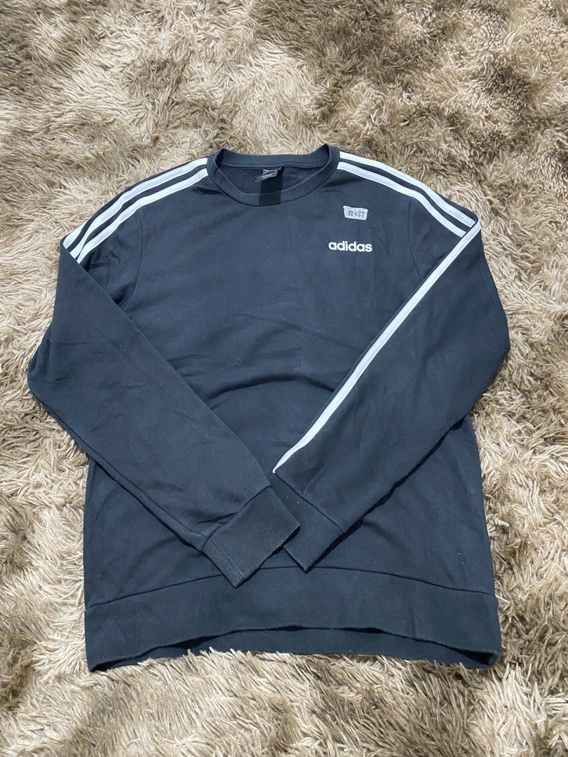 Adidas E 3S Crew FT Sweatshirt Black Size M (Category: Coats, Jackets and Outerwear) located in Cagayan de Oro. Submitted by sepamorash53558 (Listing ID 1466328804, Image 1). Description: - Brand: Adidas - Style: Crewneck sweatshirt - Color: Black with classic white three stripes - Size: Medium (M) - Material: 70% cotton, 30% polyester - Details: Small white Adidas logo on left chest, ribbed cuffs and hem - Condition: Clean and ready to wear.