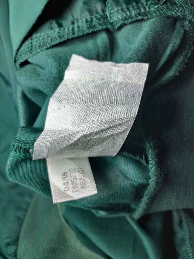 Adidas Green Track Jacket Bomber Size XL (Category: Coats, Jackets and Outerwear) located in Baguio. Submitted by padisellsz (Listing ID 1466263296, Image 2). Description: - Brand: Adidas - faded ribbings and some oil stains - Style: Bomber jacket with full zip and ribbed collar, cuffs, and hem - Color: Green with white 3-stripes and chest logo - Material: 100% polyester shell - Size: XL (approx. 24" width x 27" length) - Flaws: Noticeable spots 