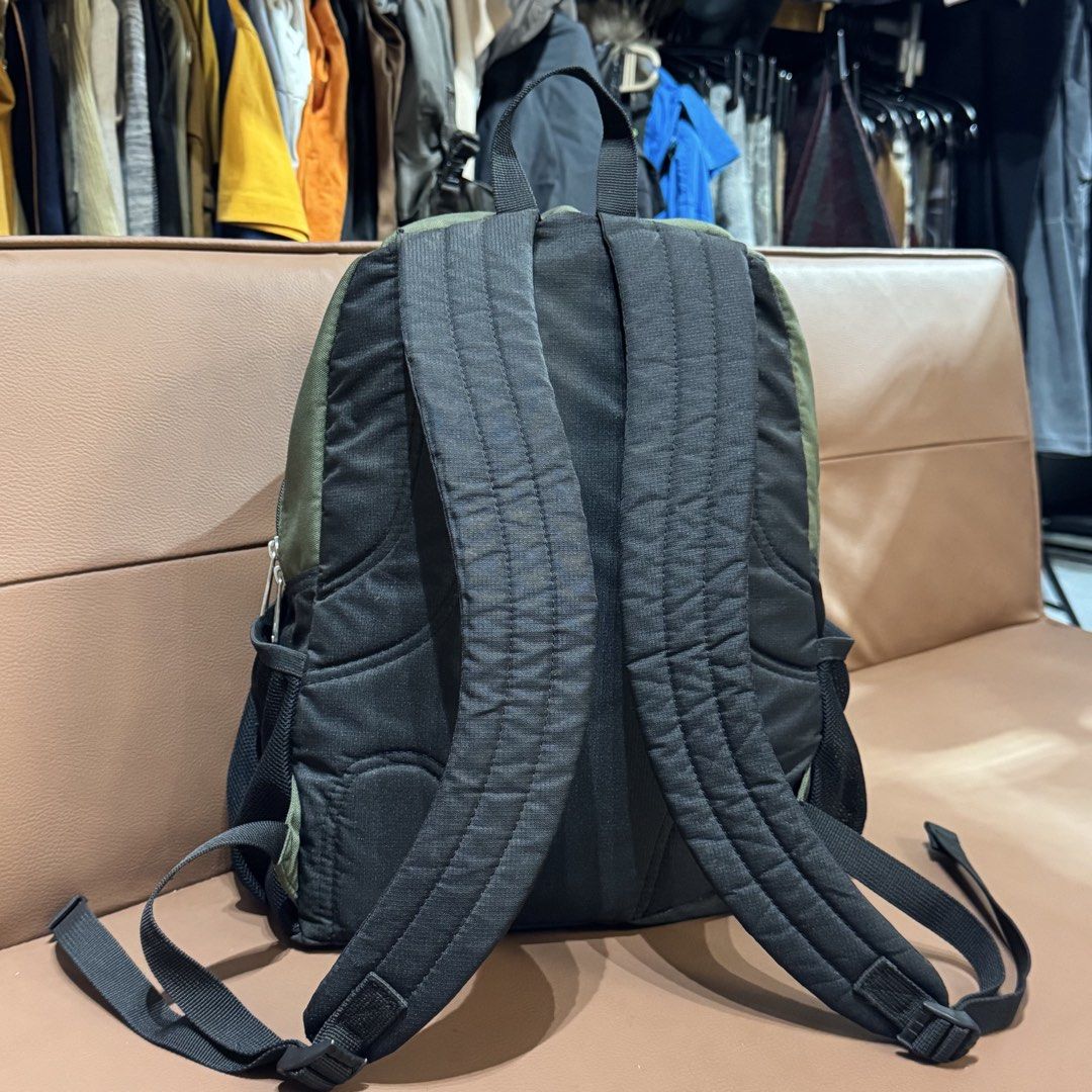 Adidas Olive Green and Black Backpack (Category: Backpacks) located in Rizal. Submitted by houseofbell (Listing ID 1466326522, Image 2). Description: - Brand: Adidas - Color: Olive green and black - Material: Durable polyester - Compartments: Zippered main compartment and front pocket - Pockets: Mesh side pockets for water bottles - Comfort: Padded adjustable shoulder straps and top haul loop - Condition: Clean interior with Adidas tag - Best for