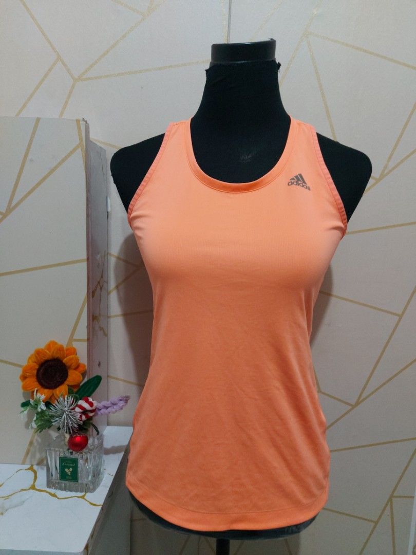 Adidas Orange top Activewear small (Category: Activewear) located in Manila. Submitted by jollyann_b1990 (Listing ID 1466318642, Image 3). Description: .