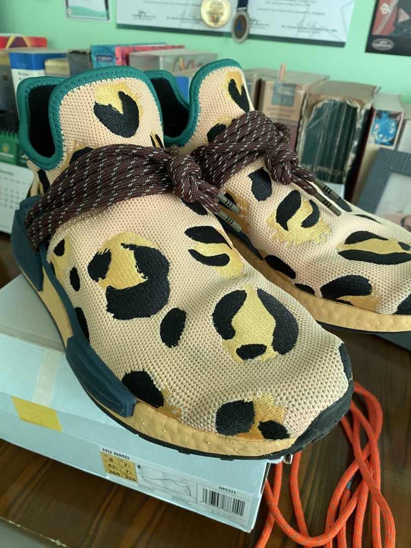 Adidas Pharrell Williams HU NMD (Category: Casual Shoes) located in Bacolod City. Submitted by cosmicowl.f43056 (Listing ID 1466320050, Image 3). Description: - Adidas Pharrell Williams HU NMD sneakers - Unique leopard print design - Includes original box - Size: US 8, UK 7 1/2, 260mm - Made in Vietnam.