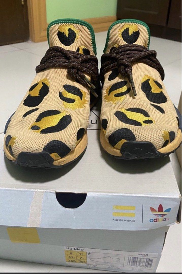 Adidas Pharrell Williams HU NMD (Category: Casual Shoes) located in Bacolod City. Submitted by cosmicowl.f43056 (Listing ID 1466320050, Image 1). Description: - Adidas Pharrell Williams HU NMD sneakers - Unique leopard print design - Includes original box - Size: US 8, UK 7 1/2, 260mm - Made in Vietnam.
