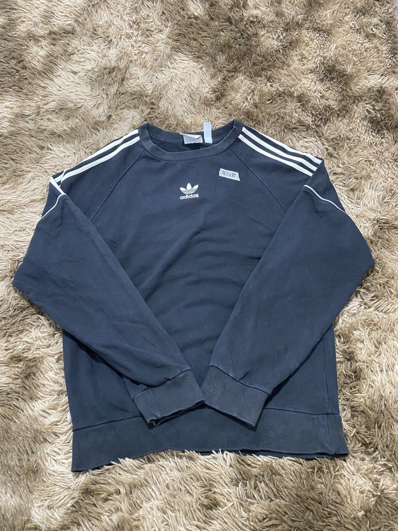 Adidas Pipe Crew Sweatshirt Black Size S (Category: Coats, Jackets and Outerwear) located in Cagayan de Oro. Submitted by sepamorash53558 (Listing ID 1466328670, Image 1). Description: - Brand: Adidas - Item: Pipe Crew Sweatshirt - Color: Black with white details - Size: Small (tag attached) - Material: 100% Cotton - Design: Embroidered trefoil logo, signature three stripes on shoulders, and matching sleeve piping - Details: Ribbed collar, cuffs,