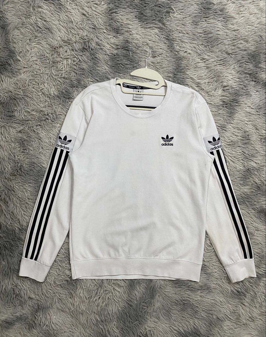 Adidas Sweater (Category: Coats, Jackets and Outerwear) located in Manila. Submitted by kurtmnla (Listing ID 1466303788, Image 1). Description: Adidas Sweater -Size S FIT / Unisex -Condition 9.5/10 -Dimes 19x25 -issue Minimal Dirt Quezon city.