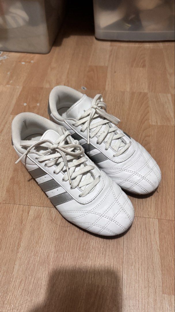 Adidas Taekwondo Cloud White/ Silver (Category: Sneakers) located in Taguig. Submitted by siyelamaree (Listing ID 1466274691, Image 3). Description: - Design: Metallic silver stripes and matching heel tab with stitched toe caps - Soles: Vintage-vibes gum rubber outsoles - Condition: Minor leather creasing and light sole scuffing from normal wear - Closure: Classic lace-up style no heel drags, intact leather - just need cleaning :) .