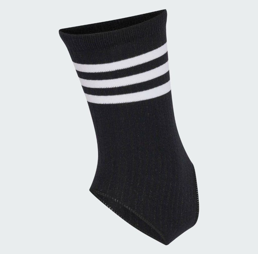 Adidas x Jennie Black Stirrup Socks (Category: Socks) located in Cebu City. Submitted by kishamarie07012 (Listing ID 1466324774, Image 2). Description: - Brand: Adidas x Jennie collaboration - Color/Design: Classic black with 3 white stripes - Branding: Embroidered Adidas Trefoil logo above "Jennie" - Material: Super comfy, stretchy ribbed knit - Fit: Open heel and toe design - Best for: Dance, workouts, and stylish sportswear - Condition: Brand 