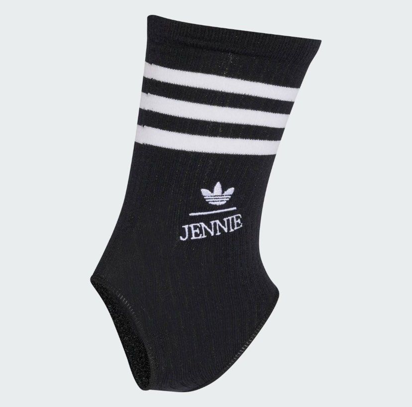 Adidas x Jennie Black Stirrup Socks (Category: Socks) located in Cebu City. Submitted by kishamarie07012 (Listing ID 1466324774, Image 1). Description: - Brand: Adidas x Jennie collaboration - Color/Design: Classic black with 3 white stripes - Branding: Embroidered Adidas Trefoil logo above "Jennie" - Material: Super comfy, stretchy ribbed knit - Fit: Open heel and toe design - Best for: Dance, workouts, and stylish sportswear - Condition: Brand 
