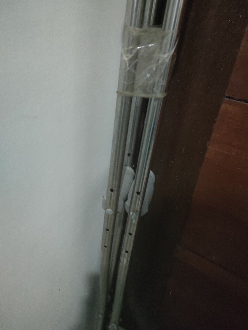 Adjustable Aluminum Underarm Crutches (Category: Medical Supplies & Tools) located in Quezon City. Submitted by Cassidy (Listing ID 1466188186, Image 3). Description: - Material: Lightweight and durable aluminum - Condition: Fully functional, ready for recovery use (minor tape residue from storage) - Adjustability: Easy push-button height adjustment on lower shafts - Comfort & Safety: Grey rubber pads on top and handgrips in the middle - Grip: No