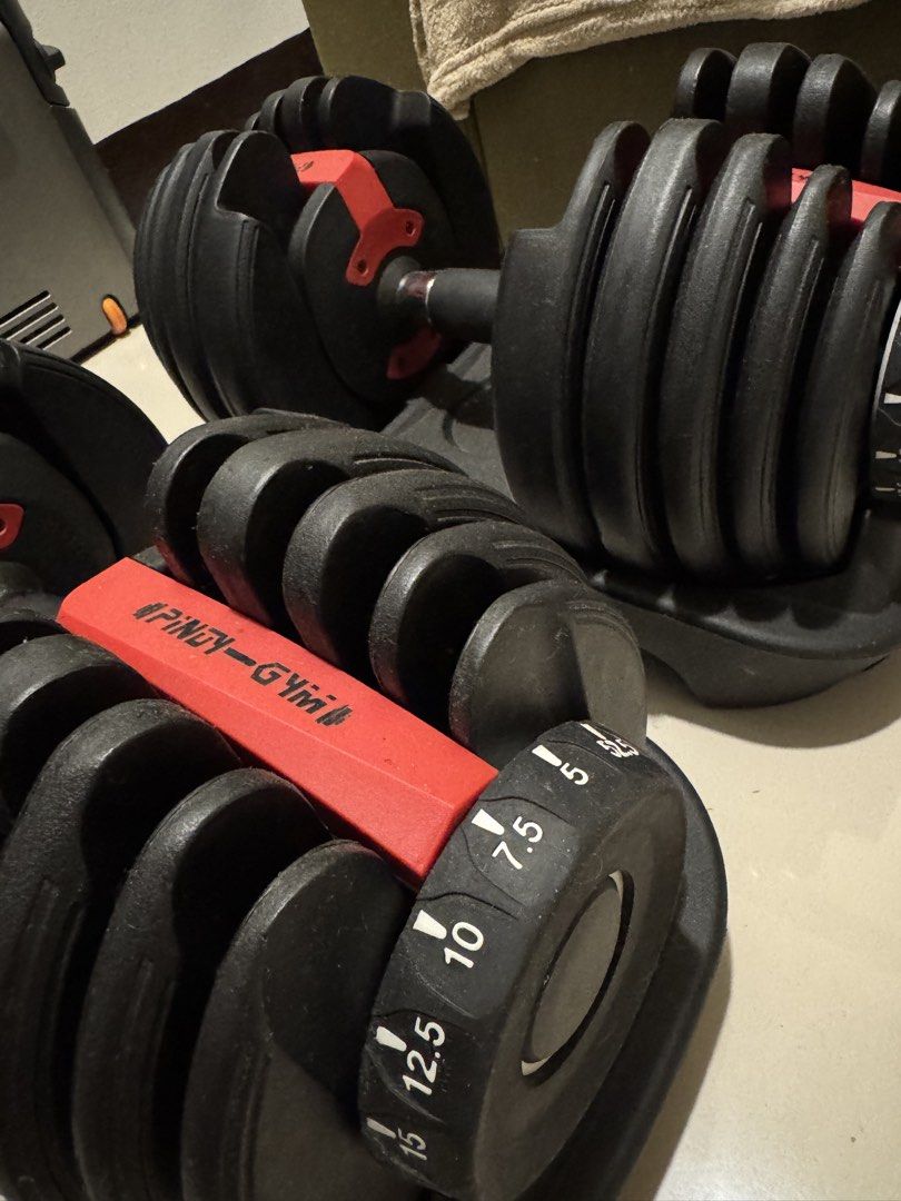 Adjustable Dumbbells Set - Pair (Category: Weights & Dumbbells) located in Caloocan City. Submitted by fruGal (Listing ID 1466306922, Image 3). Description: Each dumbbell can be adjusted up to 52.5 lbs (24kg). Reason for selling: Unused and too big for me. .