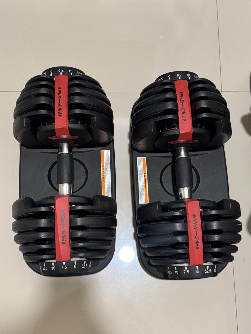 Adjustable Dumbbells Set - Pair (Category: Weights & Dumbbells) located in Caloocan City. Submitted by fruGal (Listing ID 1466306922, Image 1). Description: Each dumbbell can be adjusted up to 52.5 lbs (24kg). Reason for selling: Unused and too big for me. .