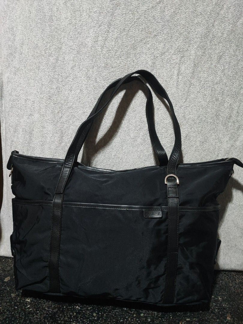 agnès b. Black Nylon Tote Bag (Category: Tote Bags) located in Baguio. Submitted by jayrgijc52758 (Listing ID 1466168257, Image 1). Description: Agnes B. Nylon tote bag Large size Very nice nito pereng prada😁 700.