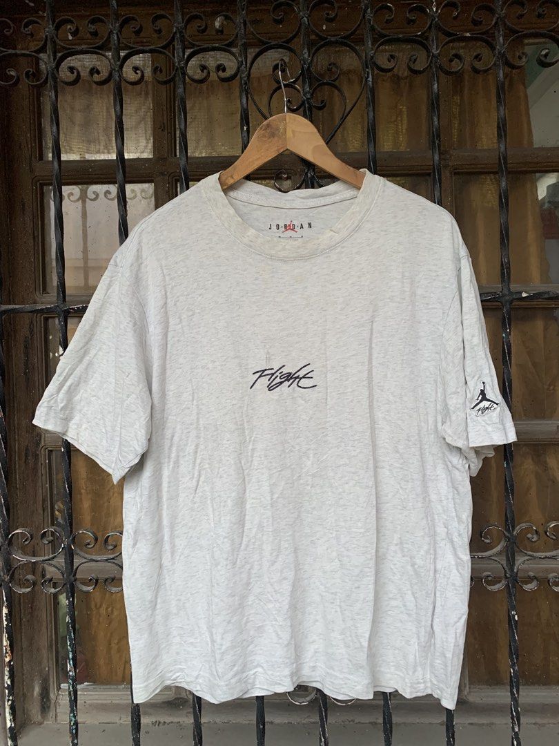 AIR JORDAN FLIGHT MID EMBROID LOGO HEATHER GRAY TEE (Category: Tshirts & Polo Shirts ) located in Bulacan. Submitted by aaron_garrucho15 (Listing ID 1466327434, Image 1). Description: - Authentic Jordan Flight t-shirt in stylish heather grey - Classic embroidered cursive logo on the chest - Iconic Jumpman logo embroidered on the left sleeve - Comfortable crew neck and short sleeves - Premium soft cotton blend fabric with a great handfeel - Jordan