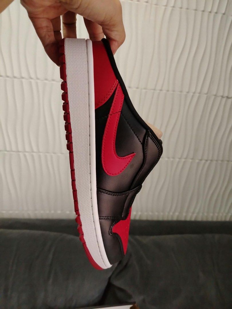 Air Jordan Mule Black Varsity Red (Category: Sneakers) located in Rizal. Submitted by sanjane923 (Listing ID 1466223481, Image 3). Description: - Model: Air Jordan Mule - Colorway: Black and Varsity Red - Size: Men's US 11 / Women's US 12.5 - Features: Easy slip-on design with a textured golf traction outsole - Packaging: Original box included - Condition: Brand new / authentic.