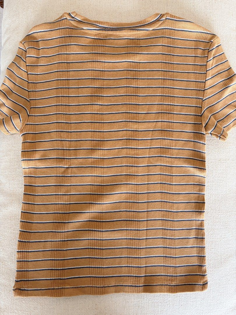 American Eagle Striped Ribbed T-Shirt (Category: Shirts) located in Quezon City. Submitted by makingroomfinds (Listing ID 1466182719, Image 2). Description: - Brand: American Eagle - Style: Short sleeve crewneck tee with ribbed texture - Colorway: Brown, white, and navy horizontal stripes - Size: XS (inner tag) - Condition: Brand new with sticker attached.