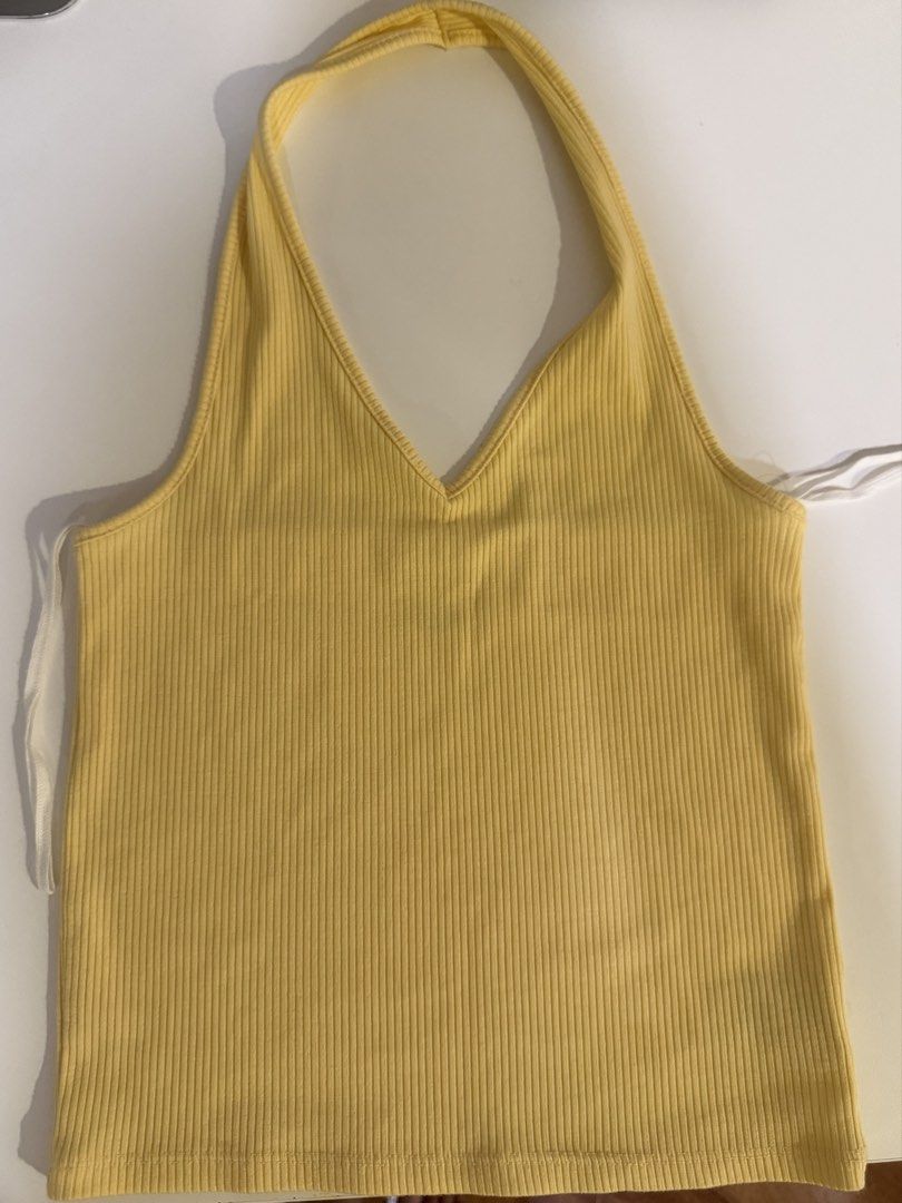 American Eagle Yellow Halter Top (small) (Category: Sleeveless) located in Binan City. Submitted by bykkd (Listing ID 1466223471, Image 1). Description: .