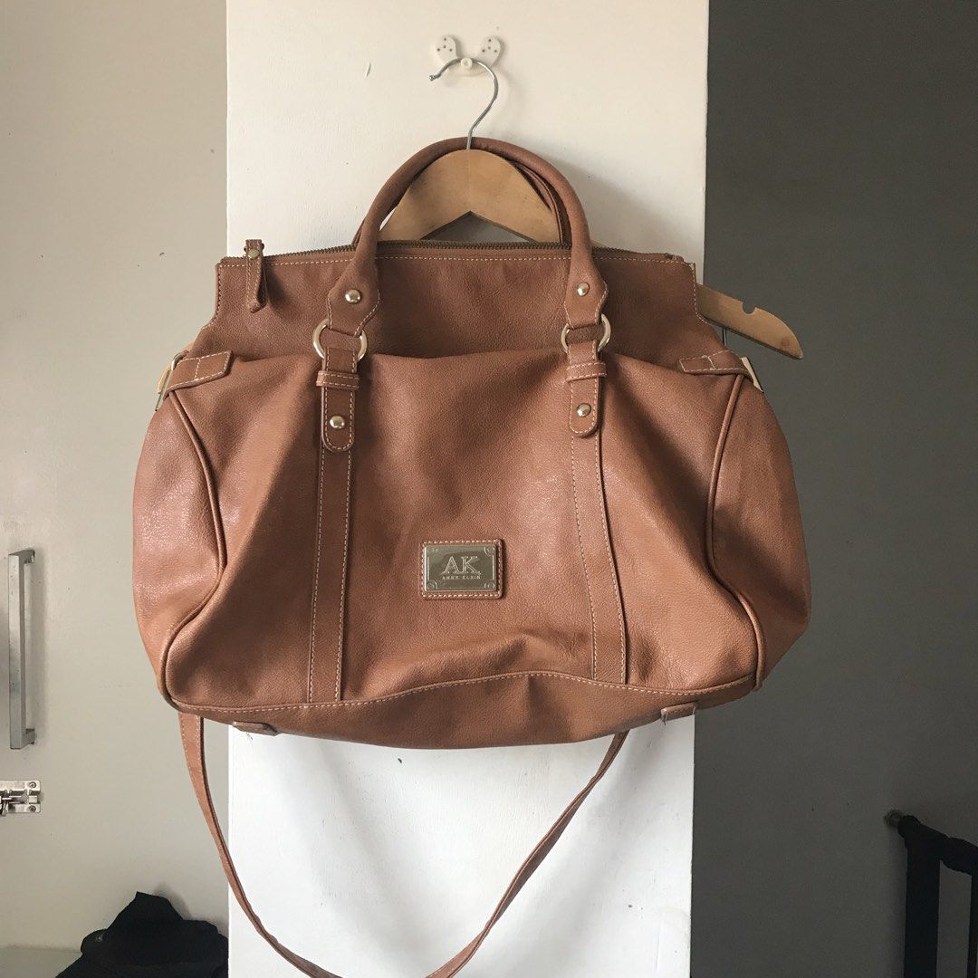 Anne Klein Two Way Sling Bag Hand Bag (Category: Shoulder Bags) located in Marikina City. Submitted by altvxz (Listing ID 1466332347, Image 1). Description: - Leather Bag - No flaws - Authentic! - Comes with a dust bag .
