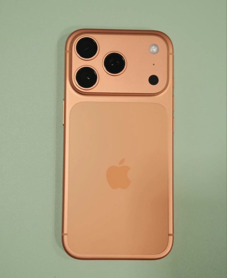 Apple iPhone 17 Pro Cosmic Orange (Category: iPhone 17 Series) located in Malabon City. Submitted by iamsupermarco (Listing ID 1466326427, Image 2). Description: Model: iPhone 17 Pro • Storage: 256GB • Color: Cosmic Orange • Battery Health: 94% • Charge Cycles: 341 • Condition: [Excellent / Very Good] • RFS: Upgrading 📦 Inclusions • Original box • Original cable that came with the phone 🤝 Meet-up at SM Grand Central or around the area. Serious 