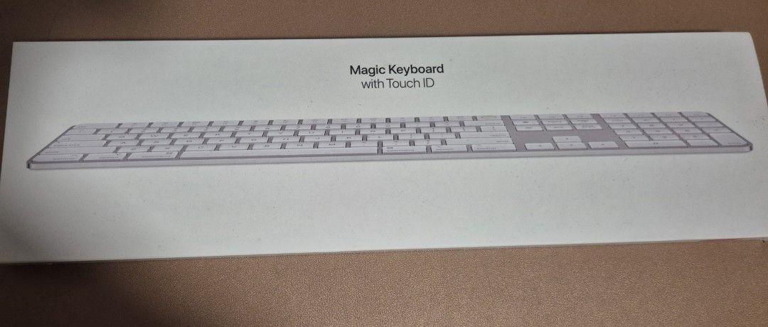 Apple Magic Keyboard with Touch ID and Numeric Keypad (Category: Computer Keyboard) located in Las Pinas. Submitted by g_tatamic (Listing ID 1466282504, Image 1). Description: Apple Magic Keyboard with Touch ID - complete with USB C - lightning cord and manual in its original box - rfs: no longer using it; decluttering - was never heavily used because i also have a mechanical keyboard.
