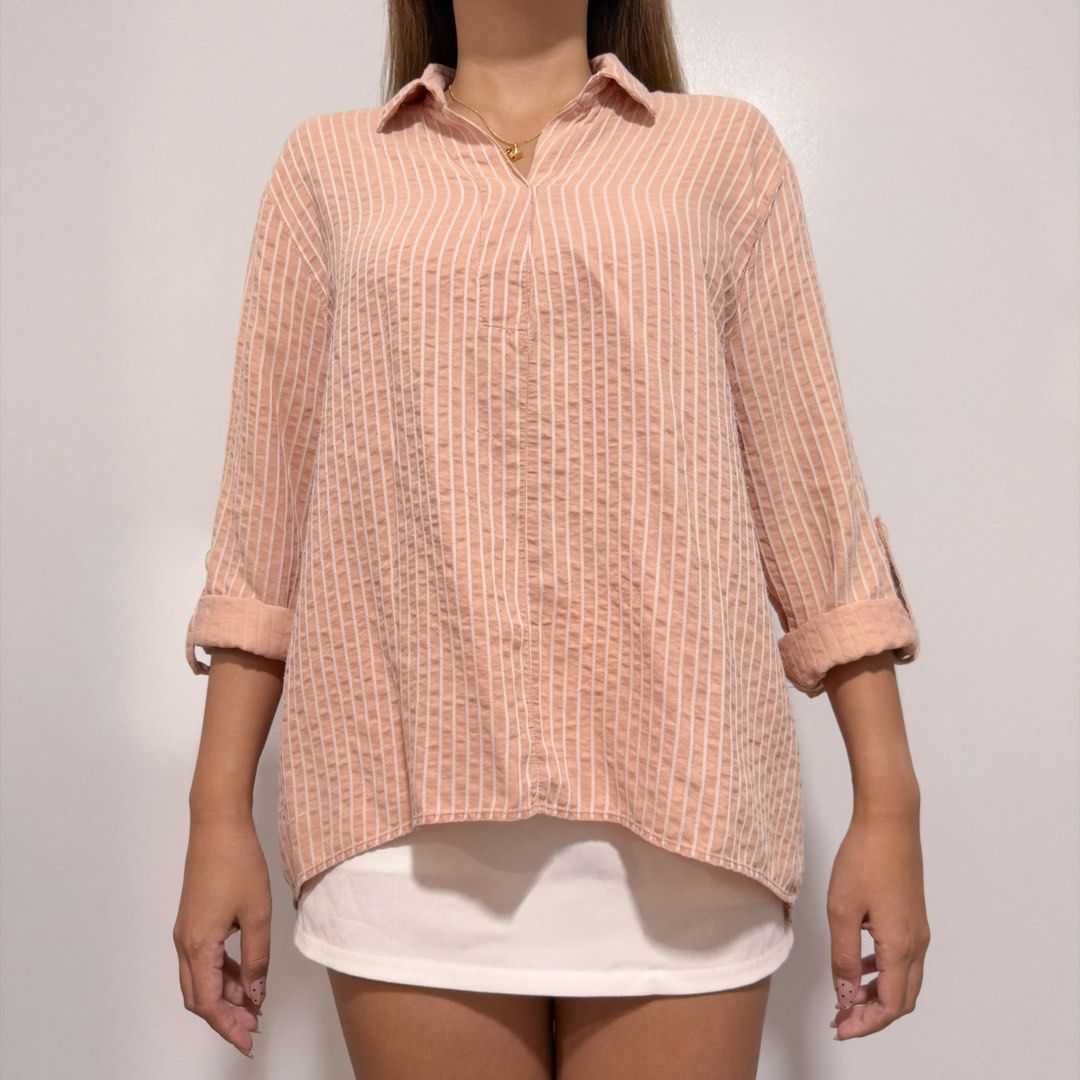 apricot striped long sleeve (Category: Longsleeves) located in Cebu City. Submitted by cuteoncue (Listing ID 1466188960, Image 3). Description: small-med (s on tag) please see last photo for a closer look at the minimal lint/fuzz present from storage – a lint roll should do the trick..