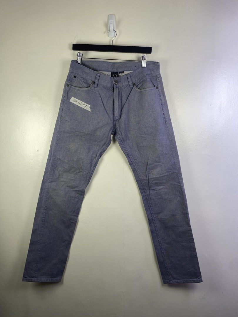 Armani Exchange Light Blue Denim Jeans (Category: Jeans) located in Manila. Submitted by declutterpromax (Listing ID 1466214049, Image 1). Description: - Brand: Armani Exchange - Color: Light blue denim - Fit: Standard straight leg - Style: Classic five-pocket with button fly - Size: Marked on taped label on the front - Origin: Made in China - Condition: Ready to wear.