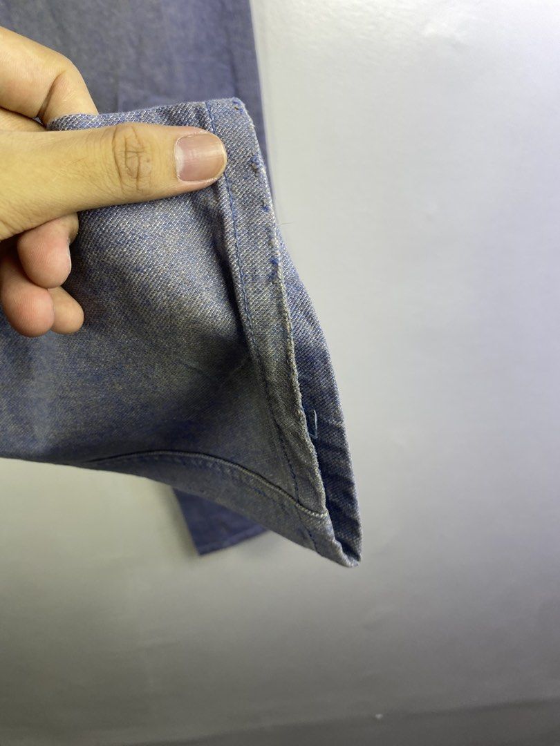 Armani Exchange Light Blue Denim Jeans (Category: Jeans) located in Manila. Submitted by declutterpromax (Listing ID 1466214049, Image 3). Description: - Brand: Armani Exchange - Color: Light blue denim - Fit: Standard straight leg - Style: Classic five-pocket with button fly - Size: Marked on taped label on the front - Origin: Made in China - Condition: Ready to wear.