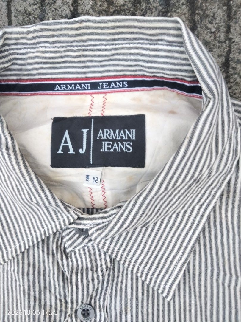 Armani Jeans (Category: Formal Shirts) located in Caloocan City. Submitted by haruconcep52476 (Listing ID 1466312282, Image 3). Description: Dimensions W21×L28 Good condition Color rate 9 Issue need wash.